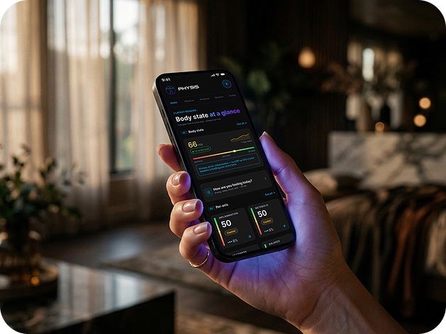 Hand holding a phone with the PHYSIS app open
